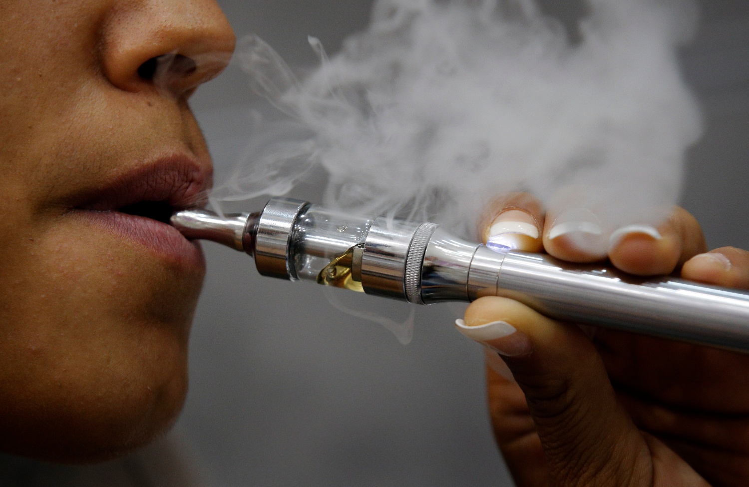 Electronic cigarettes are displayed in a Paris store, Tuesday, Oct. 8, 2013.